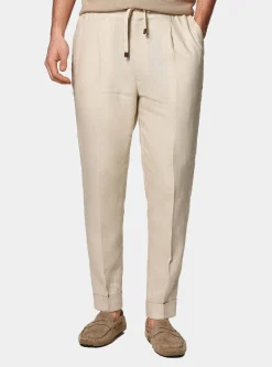 Pantaloni in puro lino con pince e coulisse
