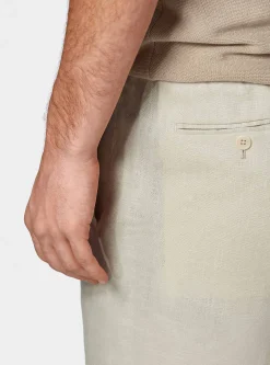 Pantaloni in puro lino con pince e coulisse