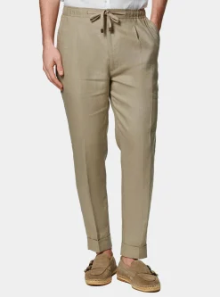 Pantaloni in puro lino con pince e coulisse