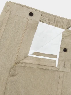 Pantaloni in puro lino con pince e coulisse