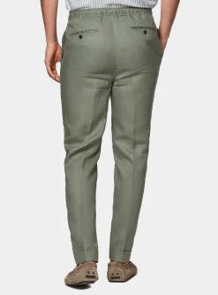 Pantaloni in puro lino con pince e coulisse