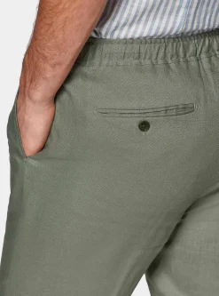 Pantaloni in puro lino con pince e coulisse