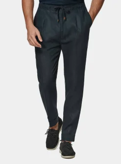 Pantaloni in puro lino con pince e coulisse