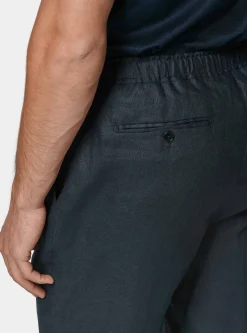 Pantaloni in puro lino con pince e coulisse