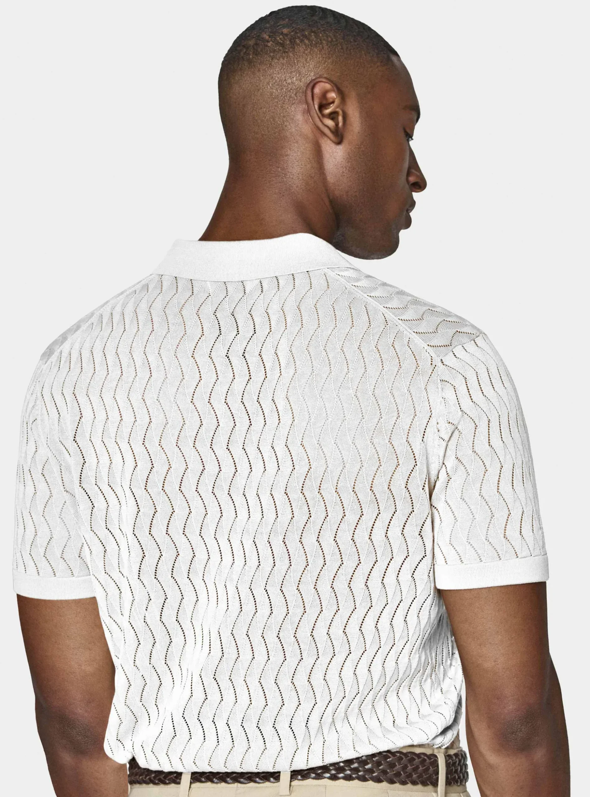 Polo in maglia traforata senza bottoni in cotone e seta
