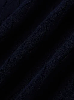 Polo in maglia traforata senza bottoni in cotone e seta