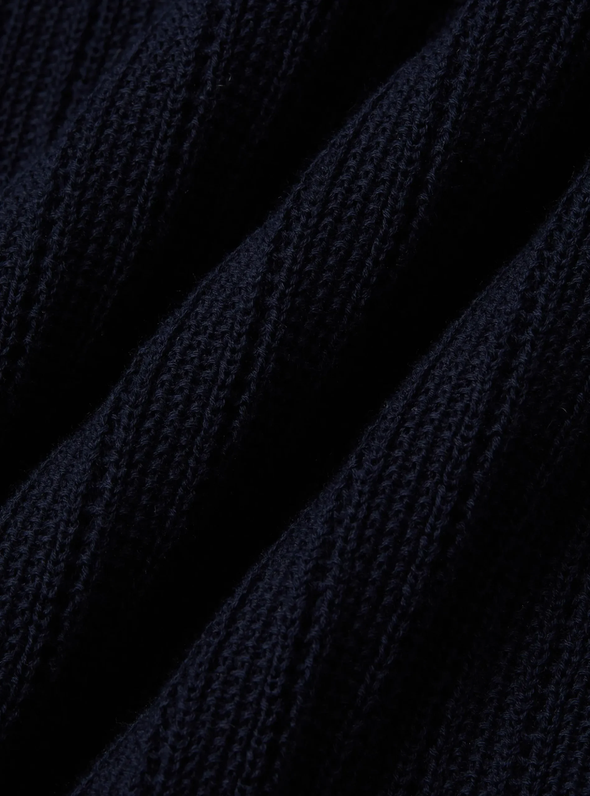 Polo in maglia traforata senza bottoni in cotone extrafine
